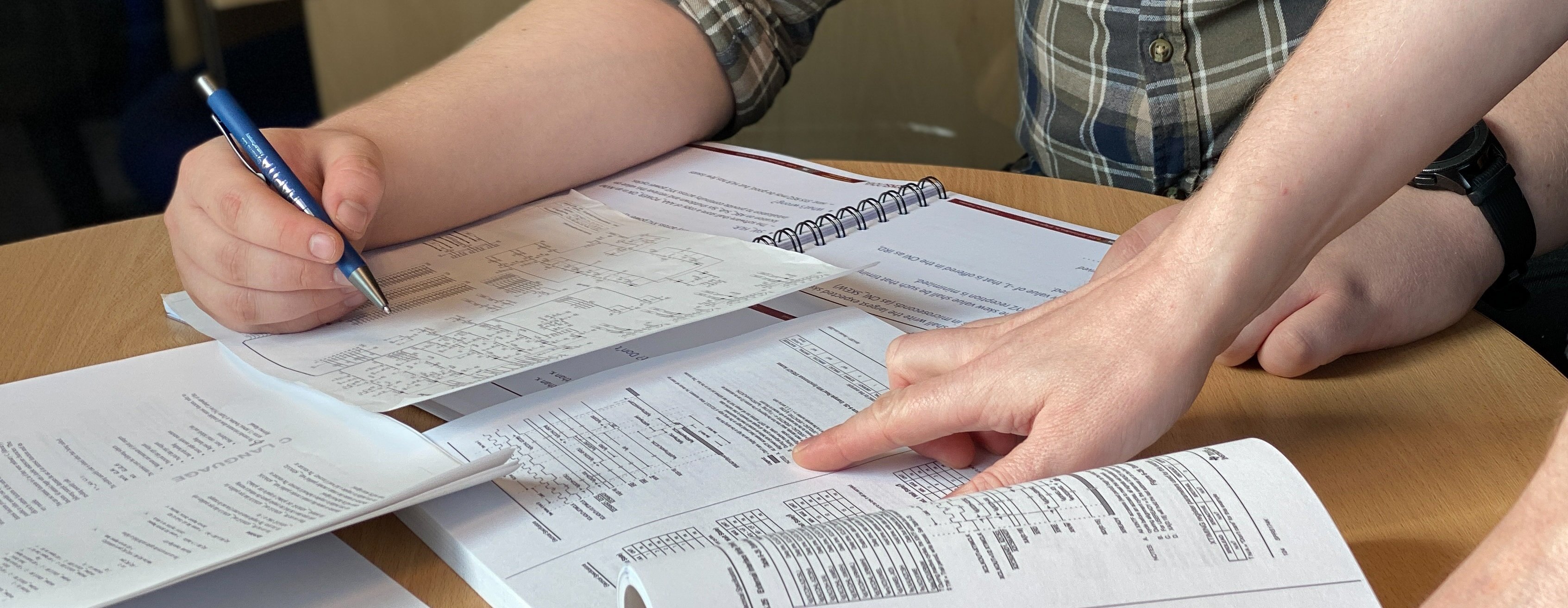 People working on documents